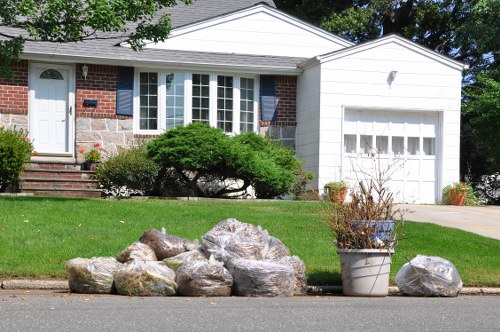 Truck and crew preparing for a junk removal job at a residential property