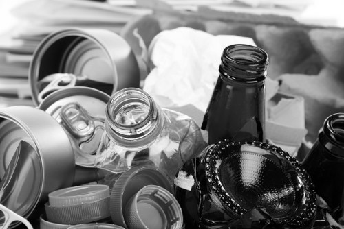 Crew preparing to remove household junk with protective gloves and uniforms