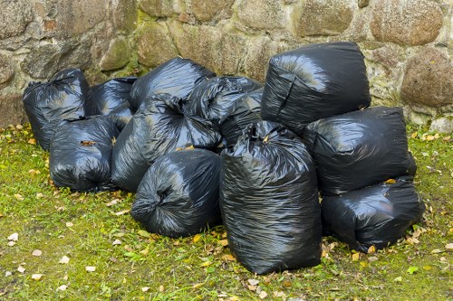 Various types of builders waste stacked for removal