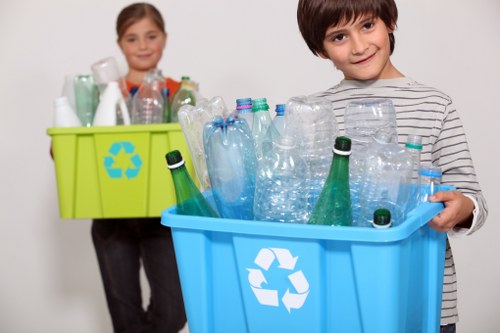 Commercial waste bin collection by a junk removal service
